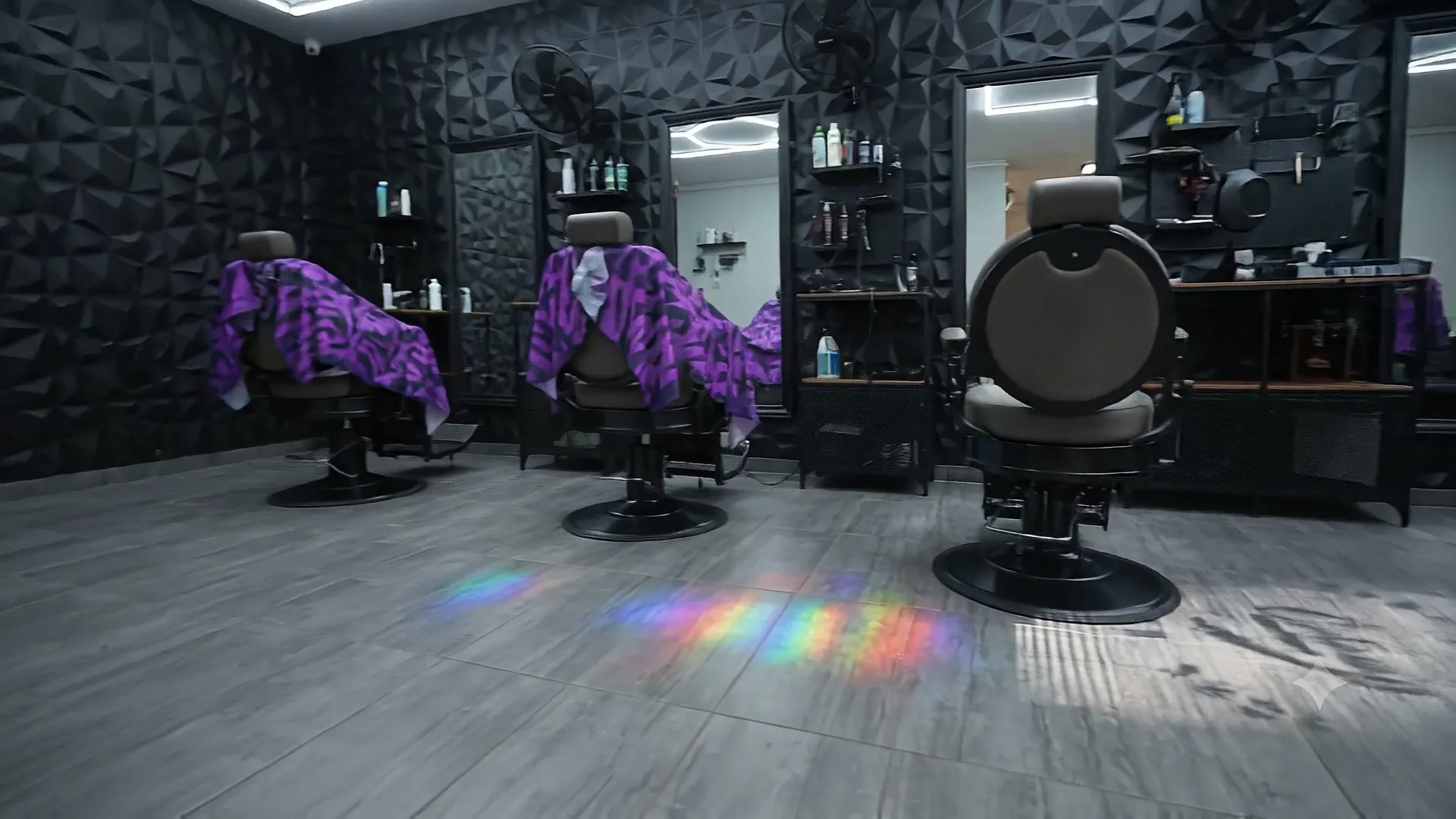 Take a seat in the Cutman shop, with mirrored stations and modern barber chairs